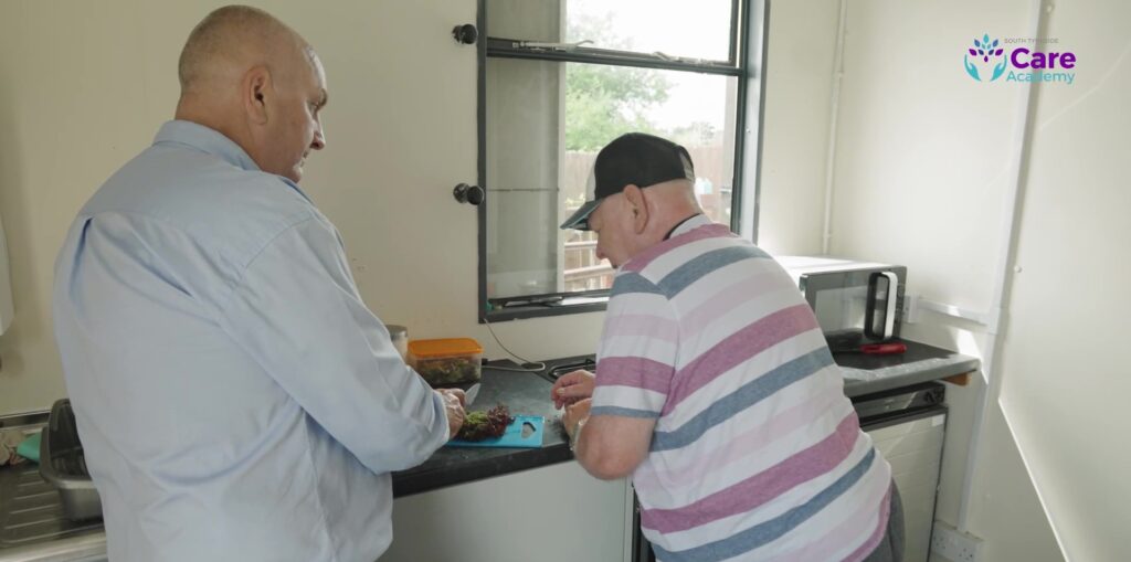 A photo of a managing director supporting a person.